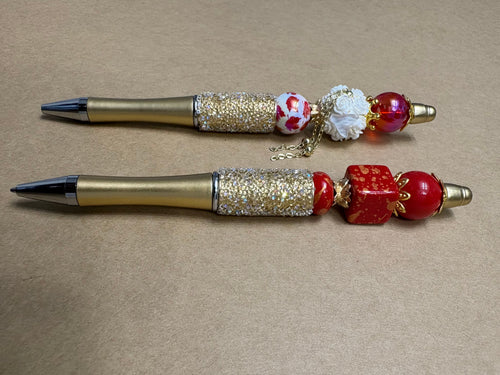 Gold and Red Flame Pens